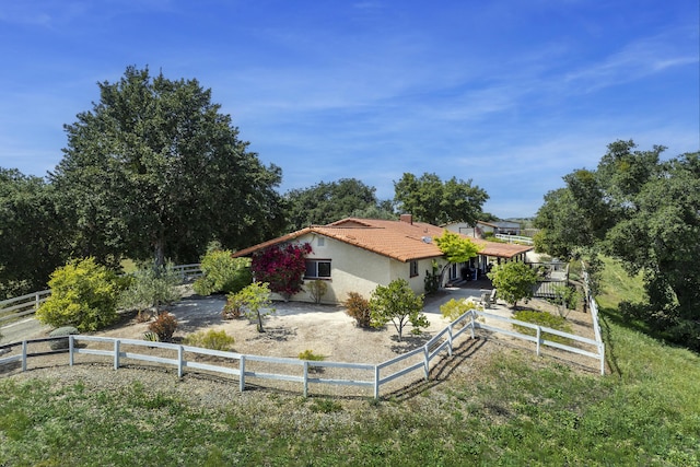 3776 Live Oak Rd, Santa Ynez, CA 93460 - exterior space with a chimney, a fenced backyard, stucco siding, and a tiled roof