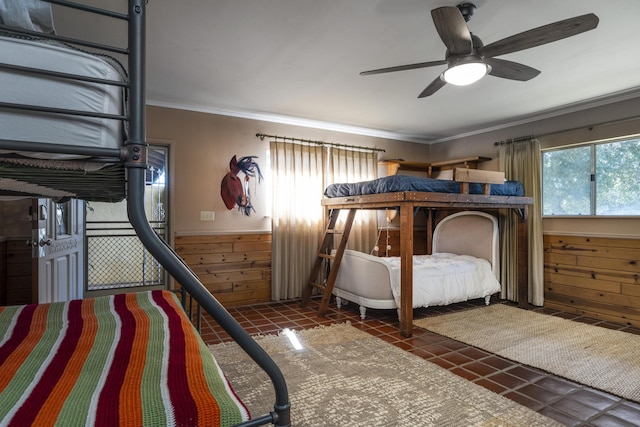 3776 Live Oak Rd, Santa Ynez, CA 93460 - bedroom with tile patterned floors, a ceiling fan, wood walls, ornamental molding, and wainscoting