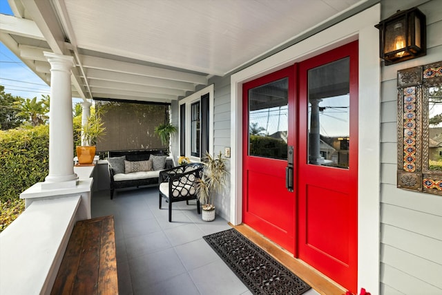 property entrance featuring a porch