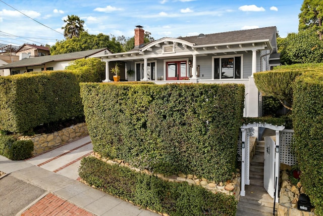 view of front of property with a chimney