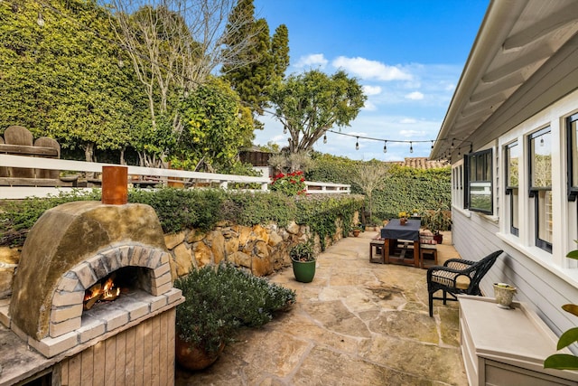 view of patio / terrace featuring fence and area for grilling