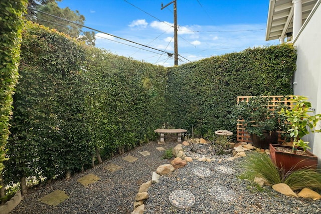 view of yard with fence