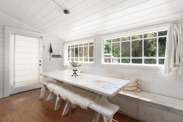 sunroom featuring wood ceiling and vaulted ceiling