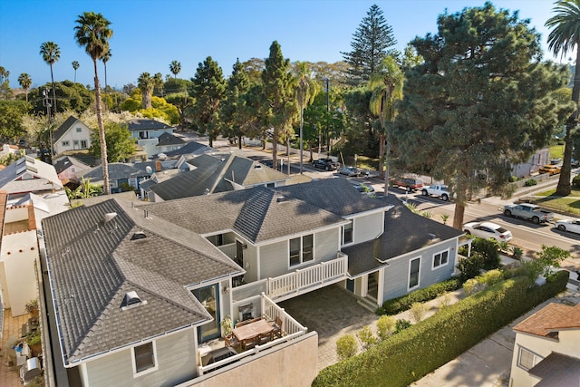 birds eye view of property with a residential view