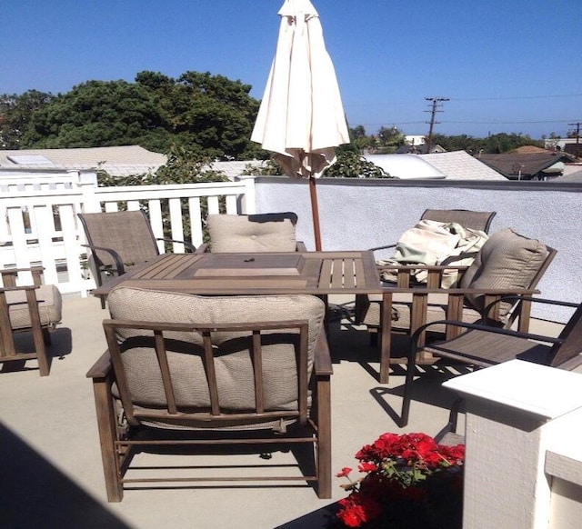 view of patio featuring outdoor dining area