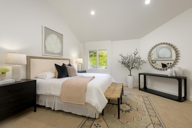 carpeted bedroom featuring recessed lighting, vaulted ceiling, and baseboards