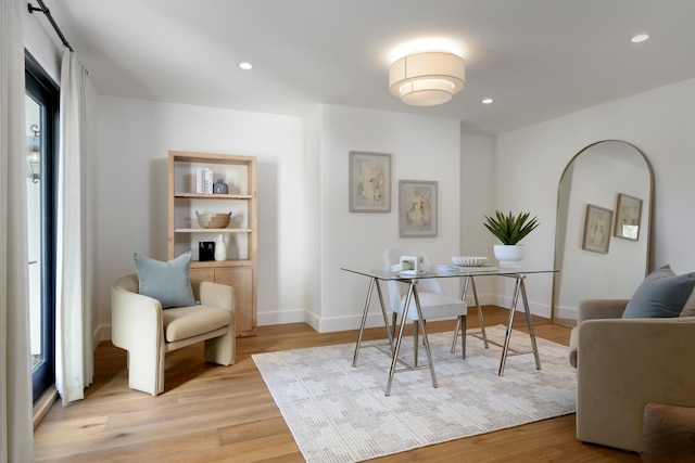 office area with baseboards, recessed lighting, and light wood-style flooring