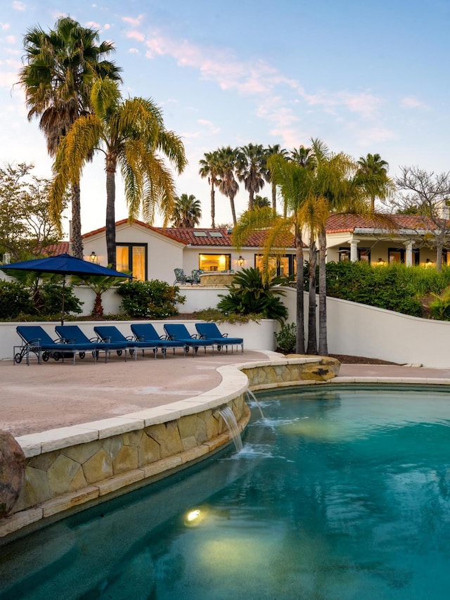 pool with a patio area