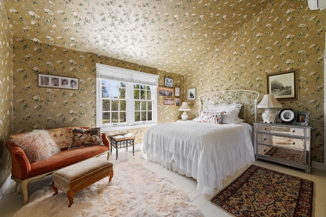 tiled bedroom featuring wallpapered walls