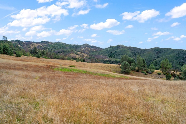 mountain view featuring a rural view