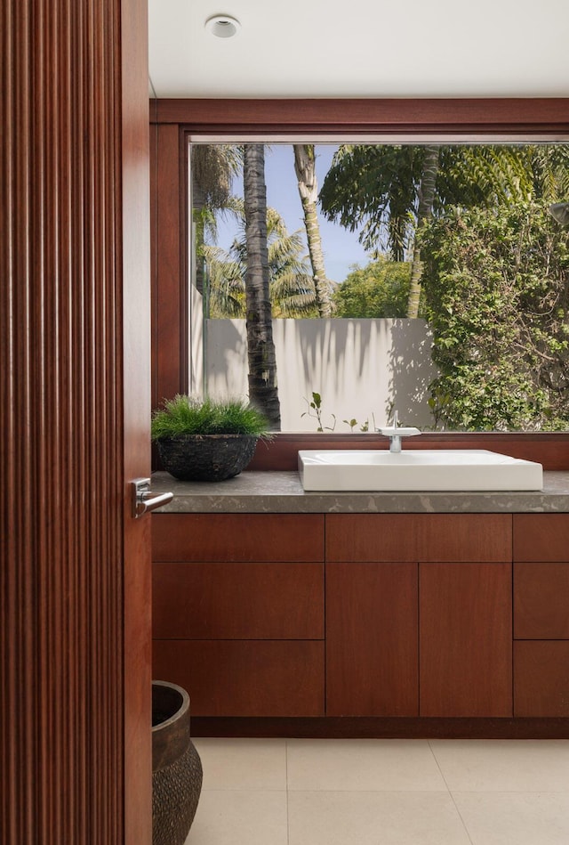 bathroom featuring vanity and tile patterned floors