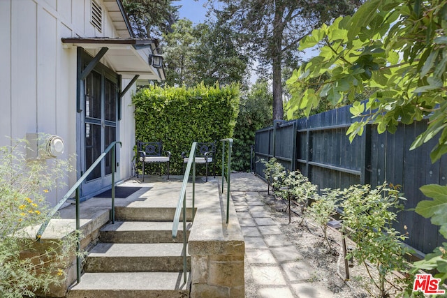 view of patio / terrace with fence