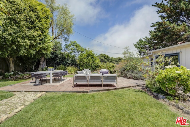 view of yard featuring a patio area and an outdoor hangout area