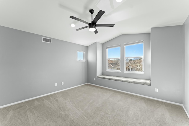 unfurnished room featuring visible vents, carpet floors, and a healthy amount of sunlight