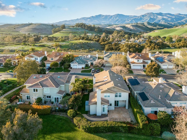 drone / aerial view featuring a mountain view and a residential view