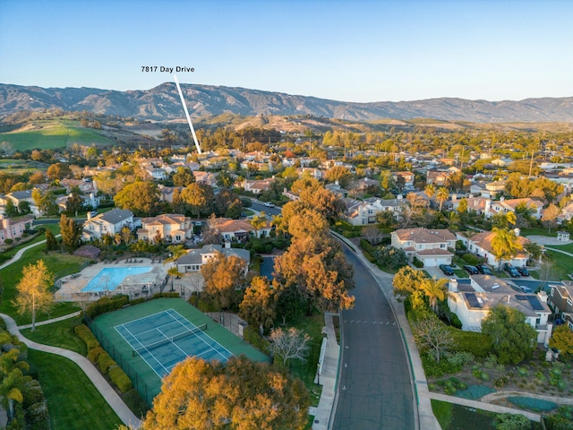 bird's eye view featuring a residential view and a mountain view