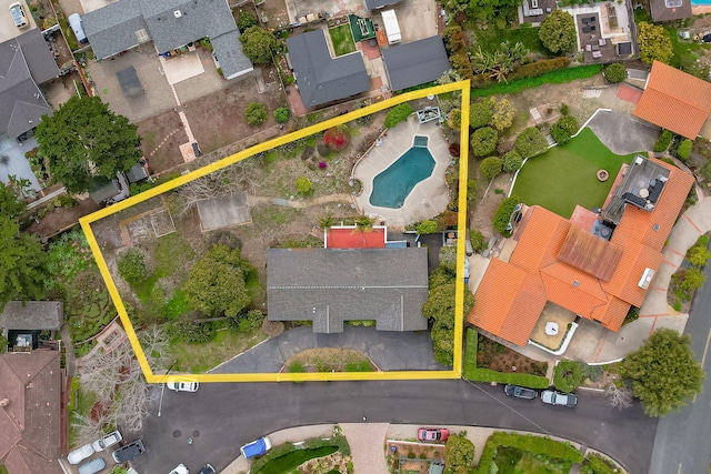 birds eye view of property with a residential view