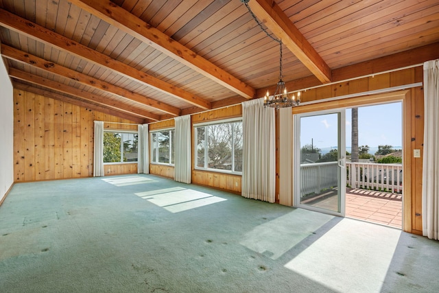 unfurnished sunroom featuring an inviting chandelier, lofted ceiling with beams, and wood ceiling