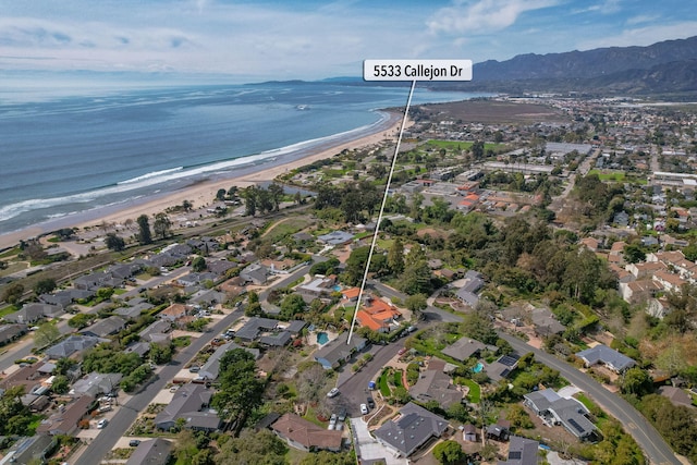 bird's eye view with a view of the beach and a water view