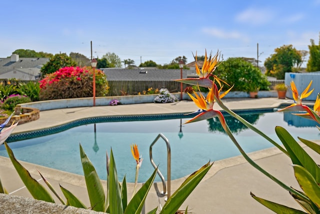 view of pool with a fenced in pool, a patio, and a fenced backyard