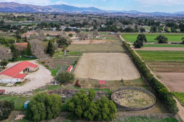 aerial view with a mountain view and a rural view