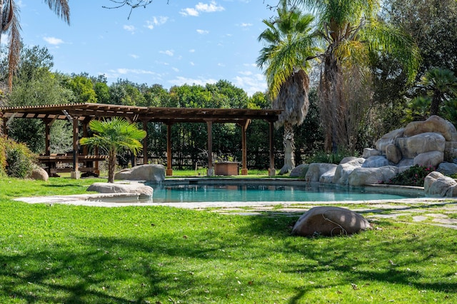 outdoor pool with a yard and a pergola