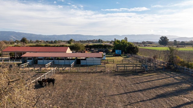 mountain view featuring a rural view