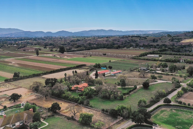 aerial view featuring a mountain view and a rural view