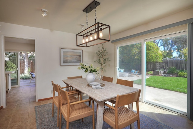 dining room with baseboards