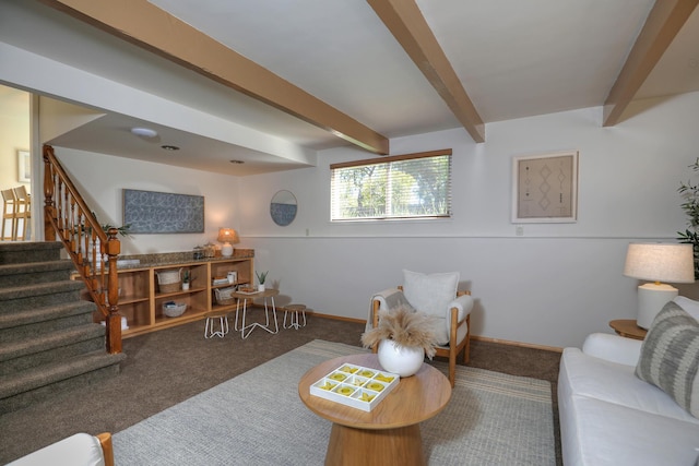 living area featuring beam ceiling, stairs, baseboards, and carpet floors