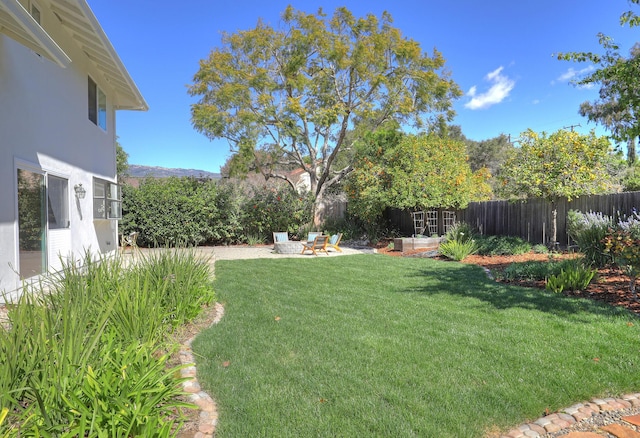 view of yard featuring a patio area and fence