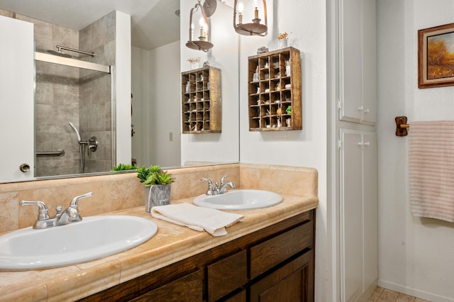 full bathroom featuring tasteful backsplash, a sink, and tiled shower