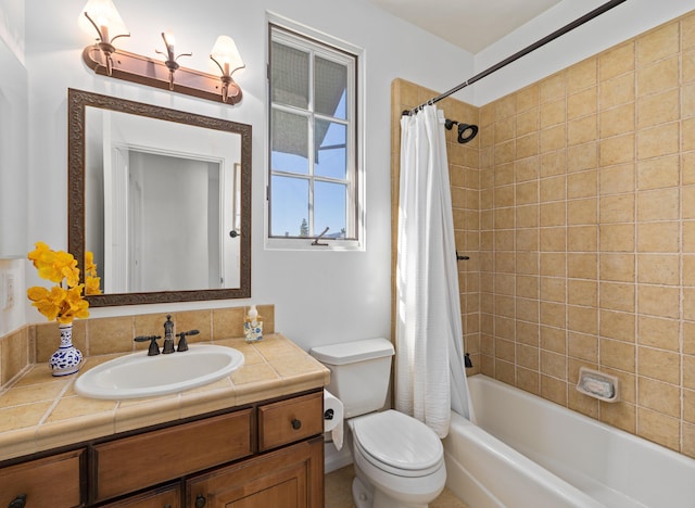 full bath featuring vanity, shower / bath combination with curtain, and toilet