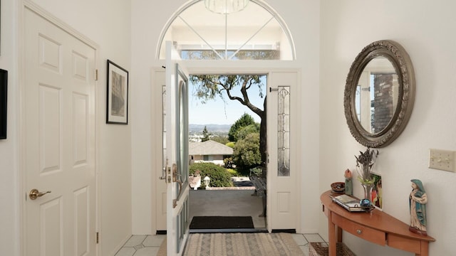 foyer with light tile patterned floors