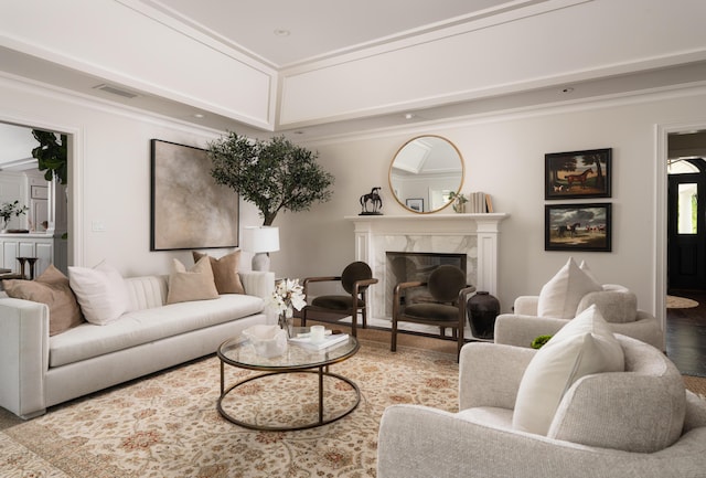 2760 Sycamore Canyon Rd, Santa Barbara, CA 93108 - living room featuring a premium fireplace, wood finished floors, visible vents, and ornamental molding