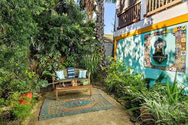 view of patio featuring fence