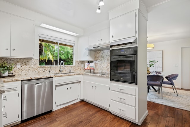 kitchen with dark wood finished floors, a sink, black appliances, under cabinet range hood, and backsplash