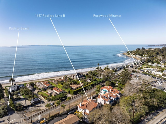 aerial view with a view of the beach and a water view