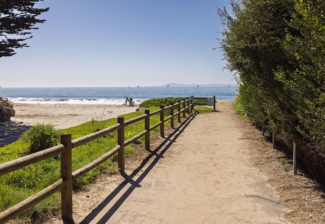 property view of water featuring a beach view