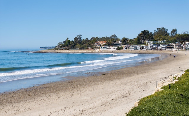 property view of water featuring a beach view