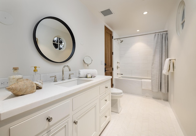 bathroom with visible vents, toilet, shower / tub combo with curtain, recessed lighting, and vanity