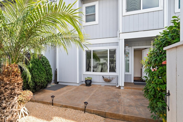 doorway to property with a patio