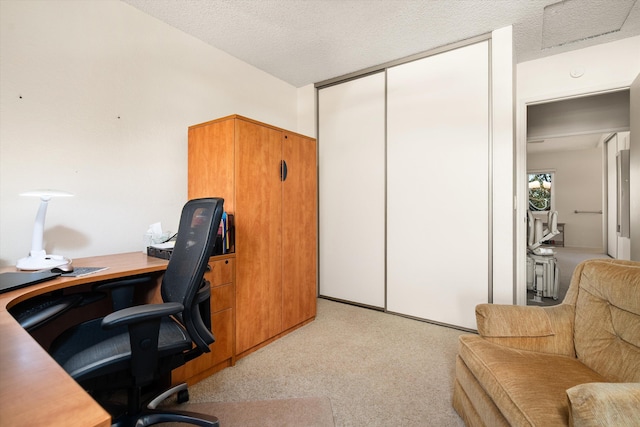 home office featuring visible vents and a textured ceiling