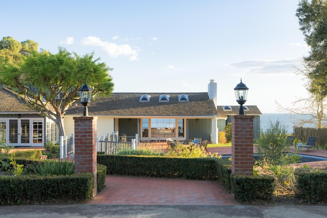 ranch-style home featuring brick siding