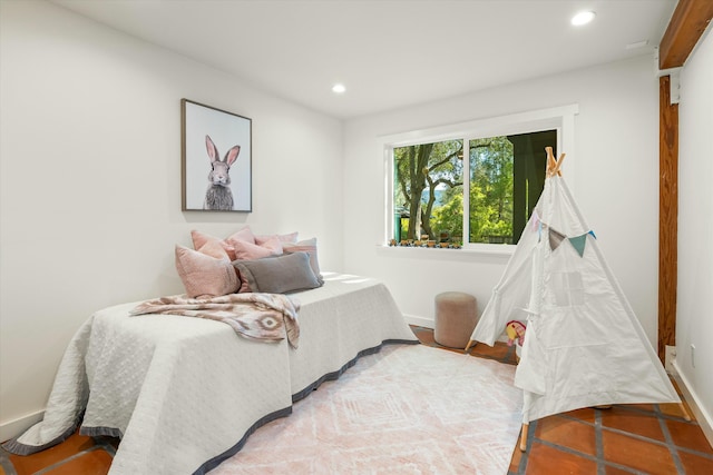 bedroom with recessed lighting and baseboards