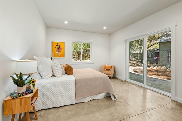 bedroom with recessed lighting, baseboards, finished concrete floors, and access to outside