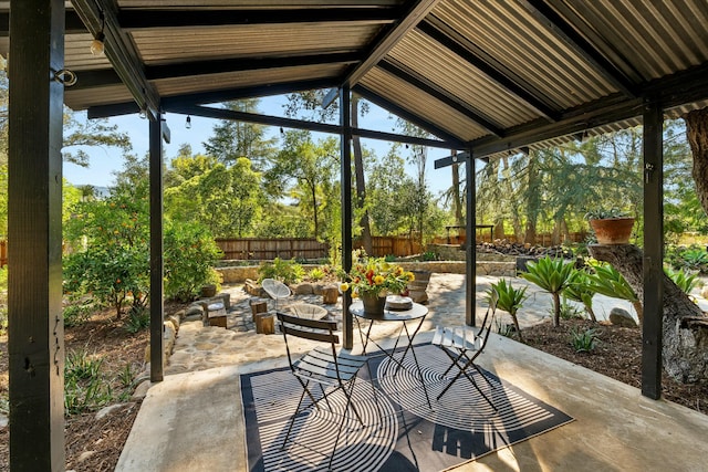 view of patio / terrace featuring fence