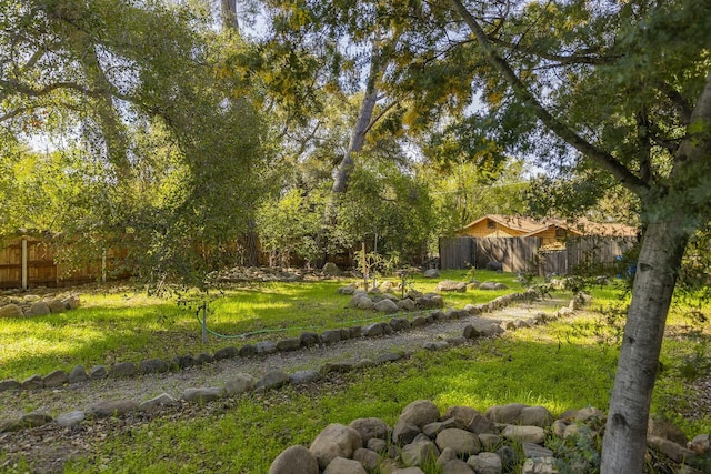 view of yard featuring fence