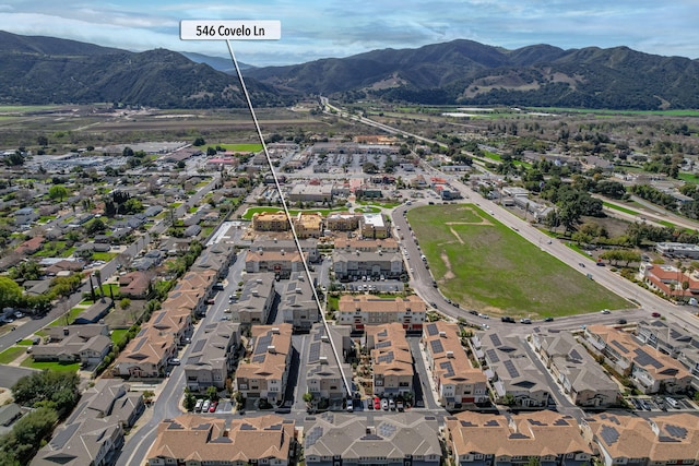 bird's eye view featuring a mountain view and a residential view