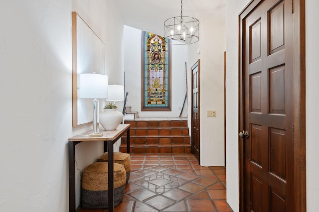 entryway featuring a notable chandelier